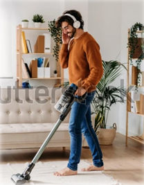 A men cleaning house with best Vacuum cleaner for apartments